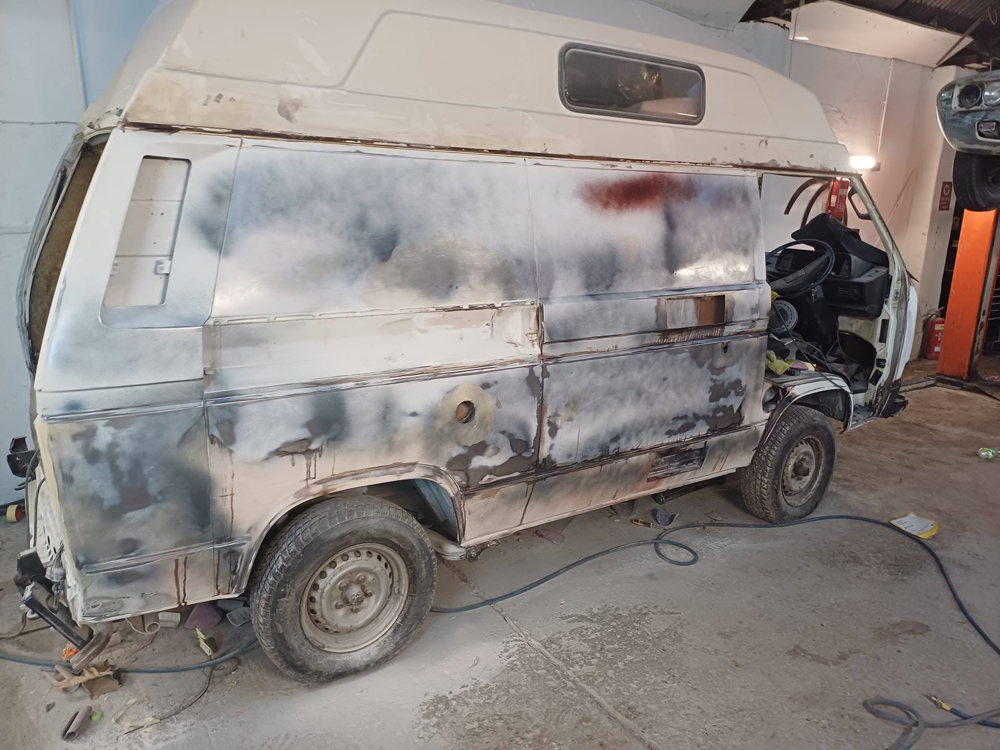 VW campervan bodywork stripped and ready for restoration paintwork prep