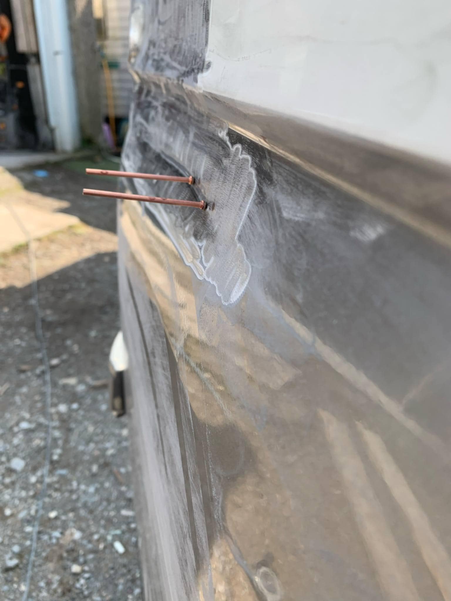 Van lower panel corrosion and metalwork repair preparation
