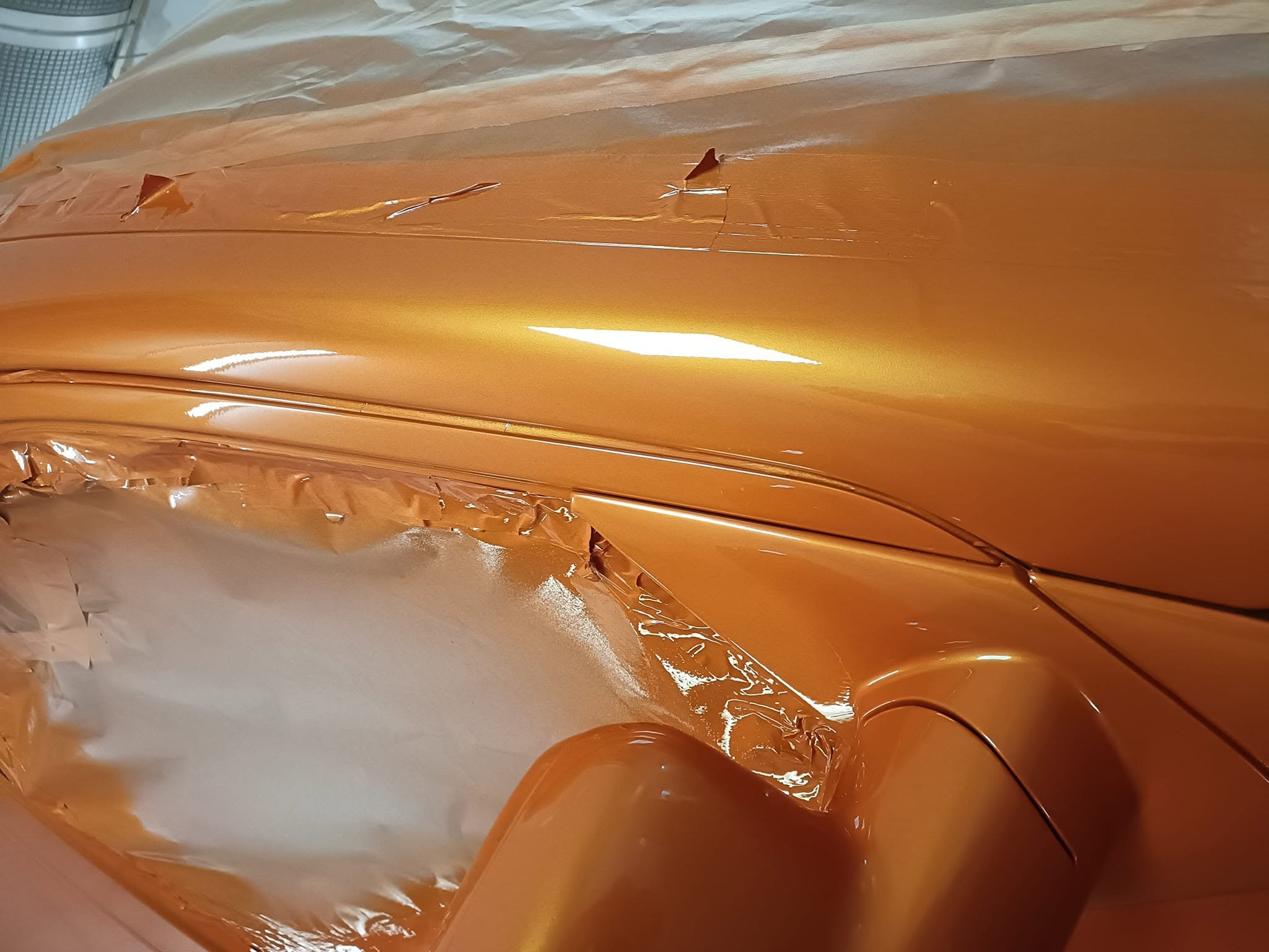 Front wing masking and paint preparation on VW Transporter